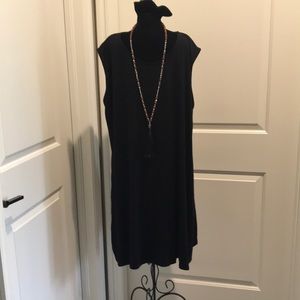 Black sleeveless dress.